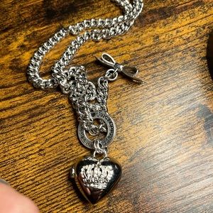 Juicy Couture Silver Heart Locket with rhinestone crown design